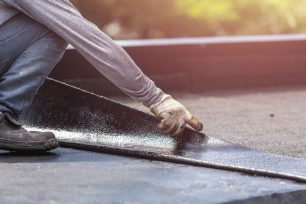 Professional Basement Waterproofing technician working in New Madison, OH